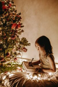 Girl with Christmas tree